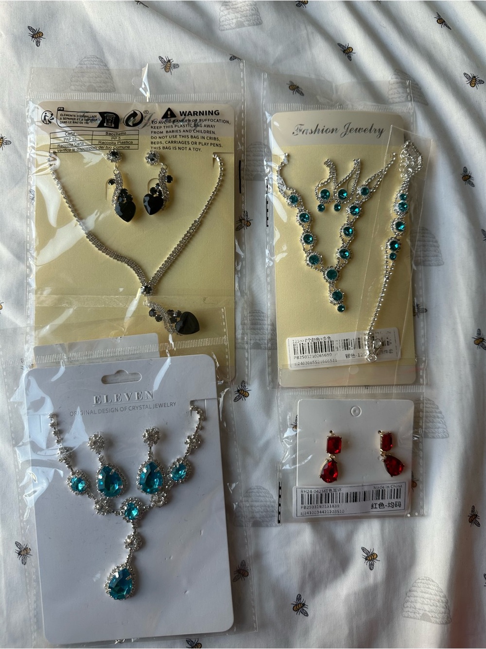 4 Item Jewelry Bundle Necklace and Earring Sets - Black, Blue & Red